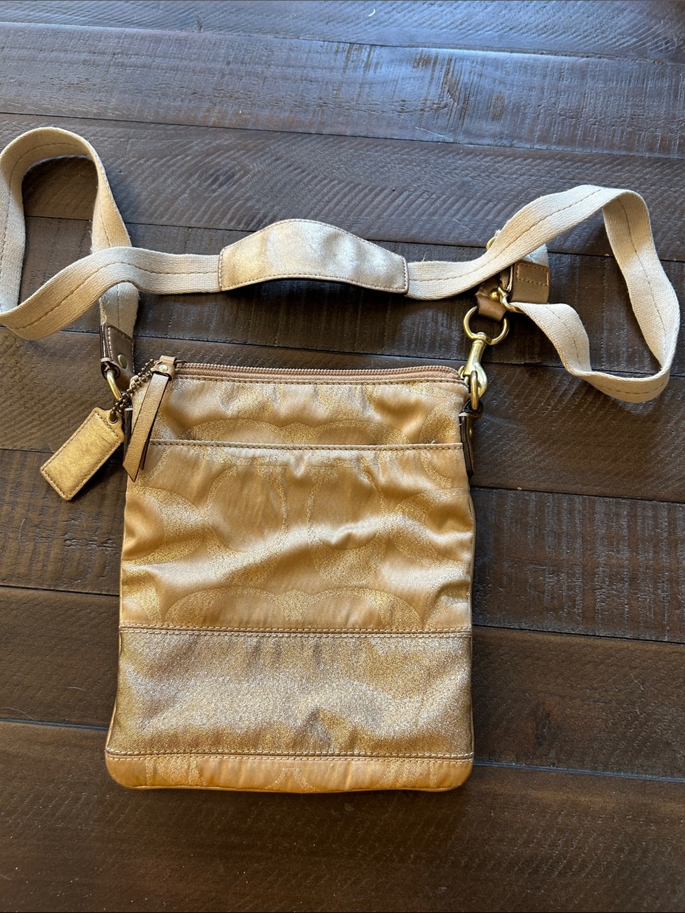 Coach crossbody gold fabric with hot pink inside